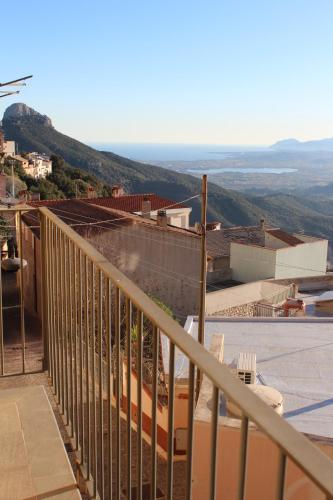 a view of a city from a balcony of a building at Sa Dommu de Kerciu Sea view with parking in Baunei