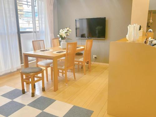 TV a/nebo společenská místnost v ubytování 小阪雅居