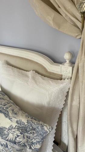 Le Gîte du Bas Manoirにあるベッド