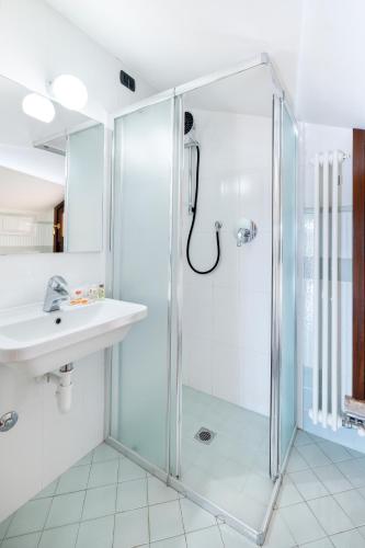 a bathroom with a shower and a sink at Le Rose - Suites e Breakfast a 5 min dal mare e Misano World Circuit in Misano Adriatico