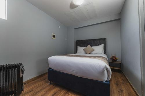 Cama o camas de una habitación en San Pedro Apartments