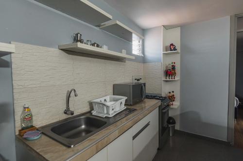 Una cocina o zona de cocina en San Pedro Apartments