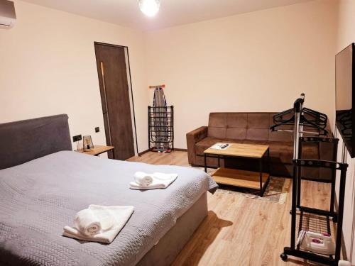 Katil atau katil-katil dalam bilik di Old Town Trinity Apartments
