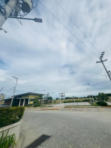 an empty street with a building in the background at Our House! in Lapu Lapu City