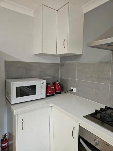 Una cocina o zona de cocina en Settlers Cabin
