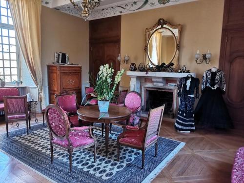 Posezení v ubytování Chateau de Courseulles
