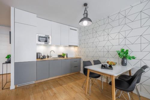Dapur atau dapur kecil di Emihouse CityVibe Apartments