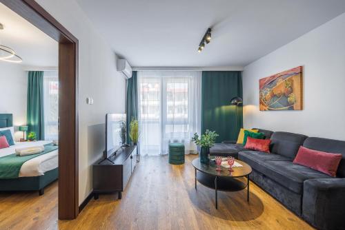 Katil atau katil-katil dalam bilik di Emihouse CityVibe Apartments