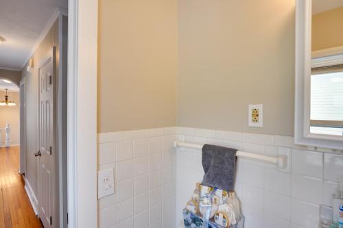 a bathroom with a towel hanging on a rack at Saratoga Springs Apartment half Mi to Downtown in Saratoga Springs