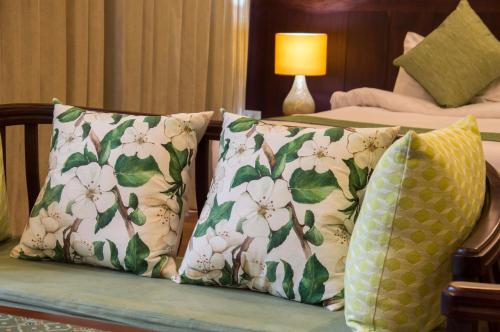 Ένα ή περισσότερα κρεβάτια σε δωμάτιο στο Sada Hotel