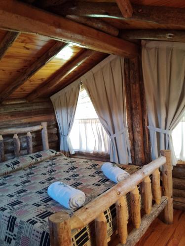 Postel nebo postele na pokoji v ubytování Cabañas Walwalün