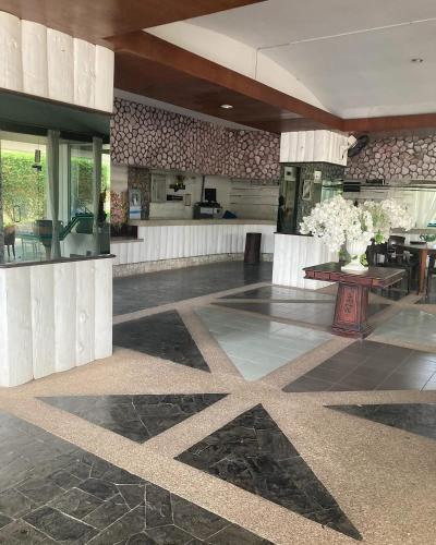a lobby with a star pattern on the floor at Sea sand Sun condominium 415 in Thang Kwian