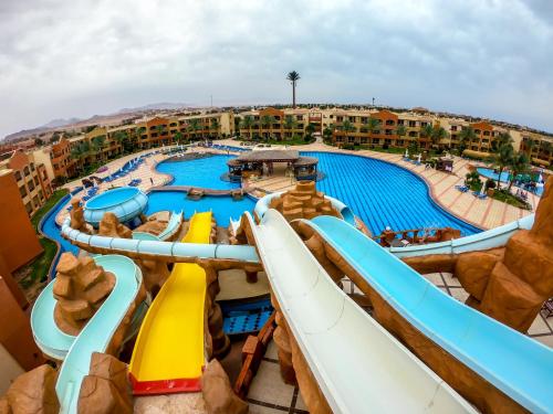 an aerial view of a water slide at a water park at Romance Regency Club in Sharm El Sheikh