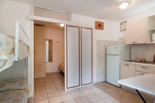 Η κουζίνα ή μικρή κουζίνα στο Club del Sole Roseto degli Abruzzi Easy Camping Village