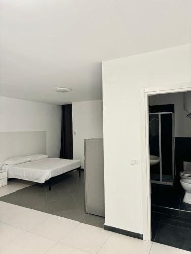 Una cama o camas en una habitación de FH rooms
