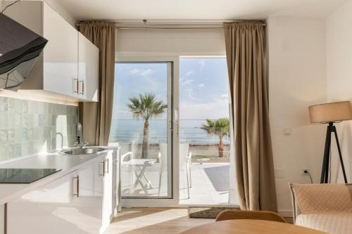Fotografie z fotogalerie ubytování Excepcional Apartamento AMANECER al borde de playa y mar, en CHALET ROQUETES v destinaci Alicante