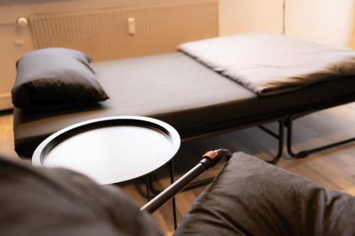 Postel nebo postele na pokoji v ubytování Schönes 2-Zimmer Appartment mit Balkon inklusive PKW Stellplatz