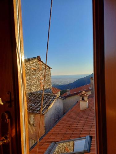 a view from a window of a roof at Rustico la Tavernetta in Seravezza