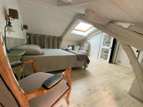 Posezení v ubytování Aux anciens remparts