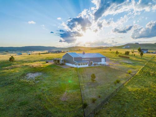 an overhead view of a house in a field at Black Hills Barndo-Hot Tub & Massage Chair in Hermosa