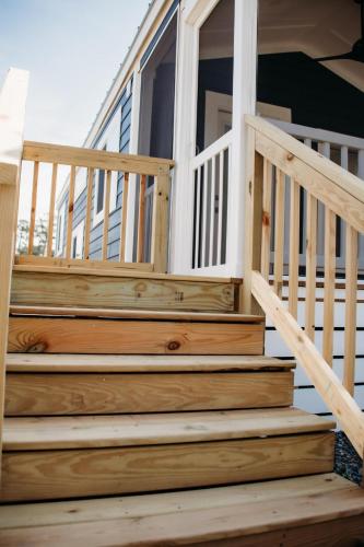 a set of stairs leading to a house at Sun Outdoors Cape Charles in Cape Charles
