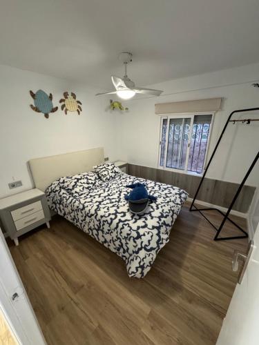 Ένα ή περισσότερα κρεβάτια σε δωμάτιο στο La casita de la playa