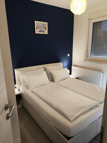 Ένα ή περισσότερα κρεβάτια σε δωμάτιο στο Apartman Sveta Klara
