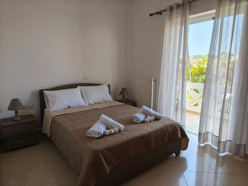 Ένα ή περισσότερα κρεβάτια σε δωμάτιο στο Van Gogh & Monet apartments