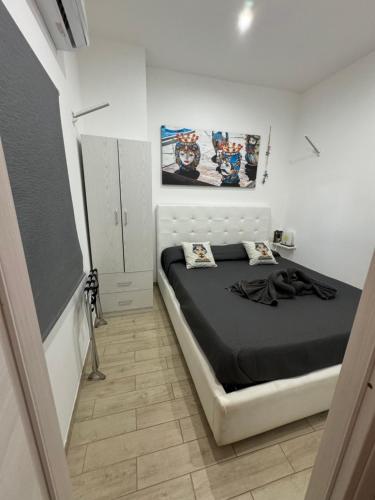 Postel nebo postele na pokoji v ubytování Arcorosa Apartment