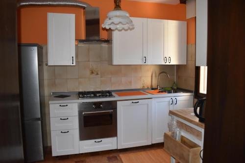 Kuchyň nebo kuchyňský kout v ubytování La Caliera 5 Casa Vacanze