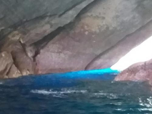 a painting of the ocean in a cave at Casa da Lúcia in Lajes das Flores