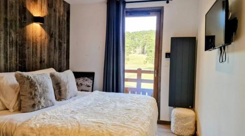 Ένα ή περισσότερα κρεβάτια σε δωμάτιο στο Loft Odette