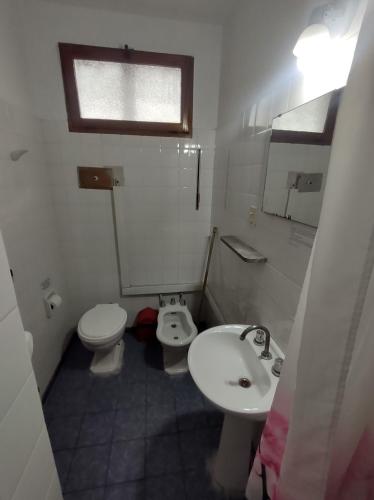 a small bathroom with a sink and a toilet at Hotel Viñas San Rafael in San Rafael
