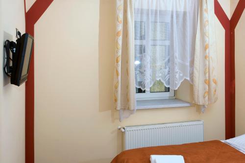 Letto o letti in una camera di Willa Zuzanna