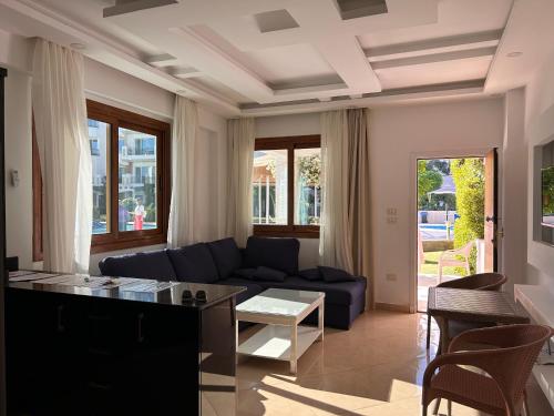 3-Bedroom Apartment on the Ground Floor with Pool View, Personal Garden Area, Backyard, and Free Beach Access in Sharm Hills Resort