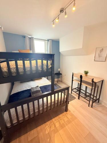 Katil atau katil-katil dalam bilik di Tottenham En Suites Guest Rooms