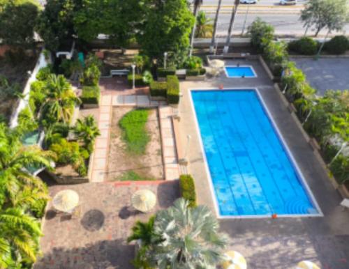 Bazén v ubytování Confortable Apartamento de Playa en Los Corales - La Guaira nebo v jeho okolí