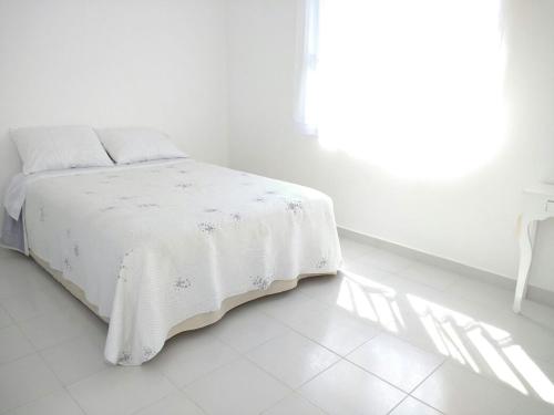 Ένα ή περισσότερα κρεβάτια σε δωμάτιο στο Casa Viveros