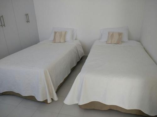 Ένα ή περισσότερα κρεβάτια σε δωμάτιο στο Casa Viveros