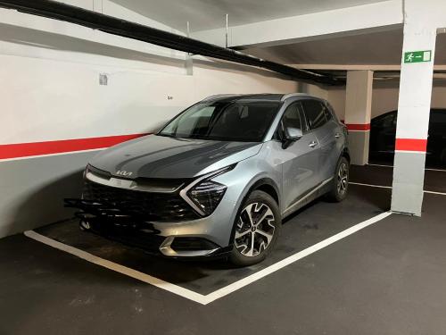 a silver car parked in a parking garage at EL BALCÖN DE AVILÉS, acogedor con garaje en centro histórico, in Avilés