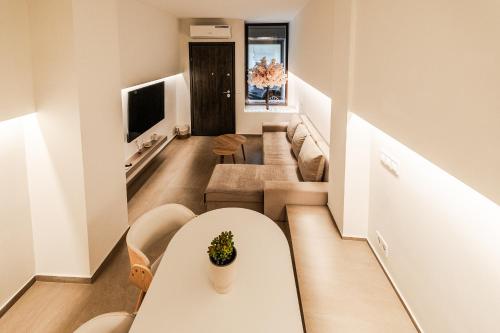 Μια τηλεόραση ή/και κέντρο ψυχαγωγίας στο Eunoia Luxury Loft