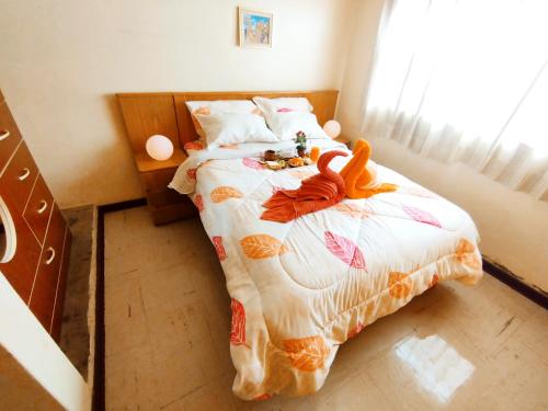 a bedroom with a bed with stuffed animals on it at Residencia en Gourmancia - Estancia & Sabor in Puno