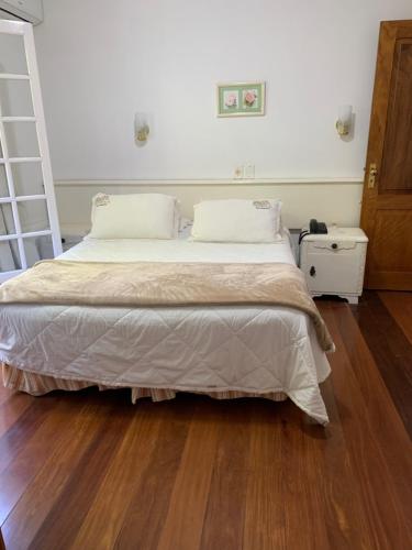Ένα ή περισσότερα κρεβάτια σε δωμάτιο στο Hotel e Spa Provençal