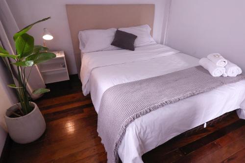 Altillo privado con desayuno artesanal en pleno centroにあるベッド