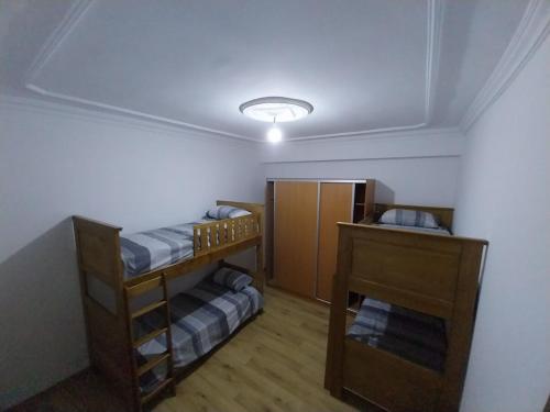 Postel nebo postele na pokoji v ubytování Eftalya Hostel