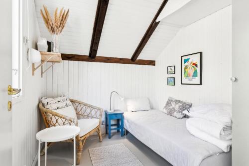 Ένα ή περισσότερα κρεβάτια σε δωμάτιο στο Cozy Small House Close To Ebeltoft