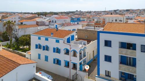 an aerial view of a city with buildings at La Vela bianca in Calasetta