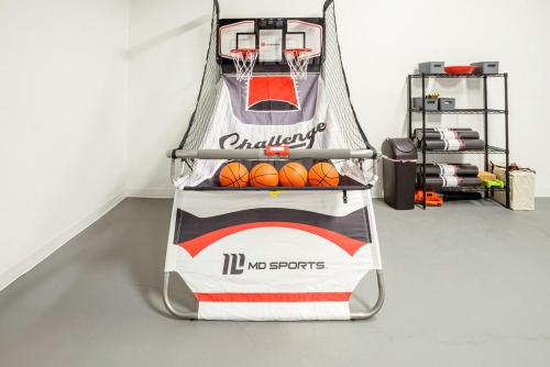 a basketball hoop with a basket and balls on it at Boulder Luxury Getaway 7 acres River & Pond in Boulder