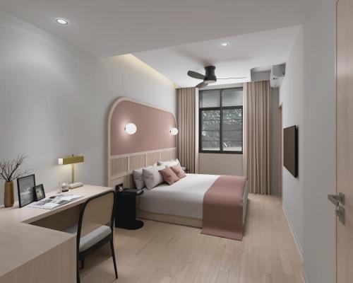 Voodi või voodid majutusasutuse The Initial Sama Serviced Residences toas