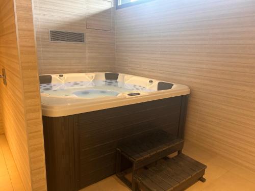 a bathroom with a jacuzzi tub in a room at Beautiful Modern Town House - EDEN RESORT in Mijas Costa